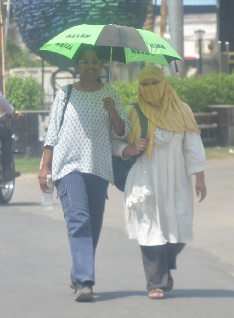Blazing sun and gusts of scorching wind left people miserable, while the humidity caused profuse sweating.