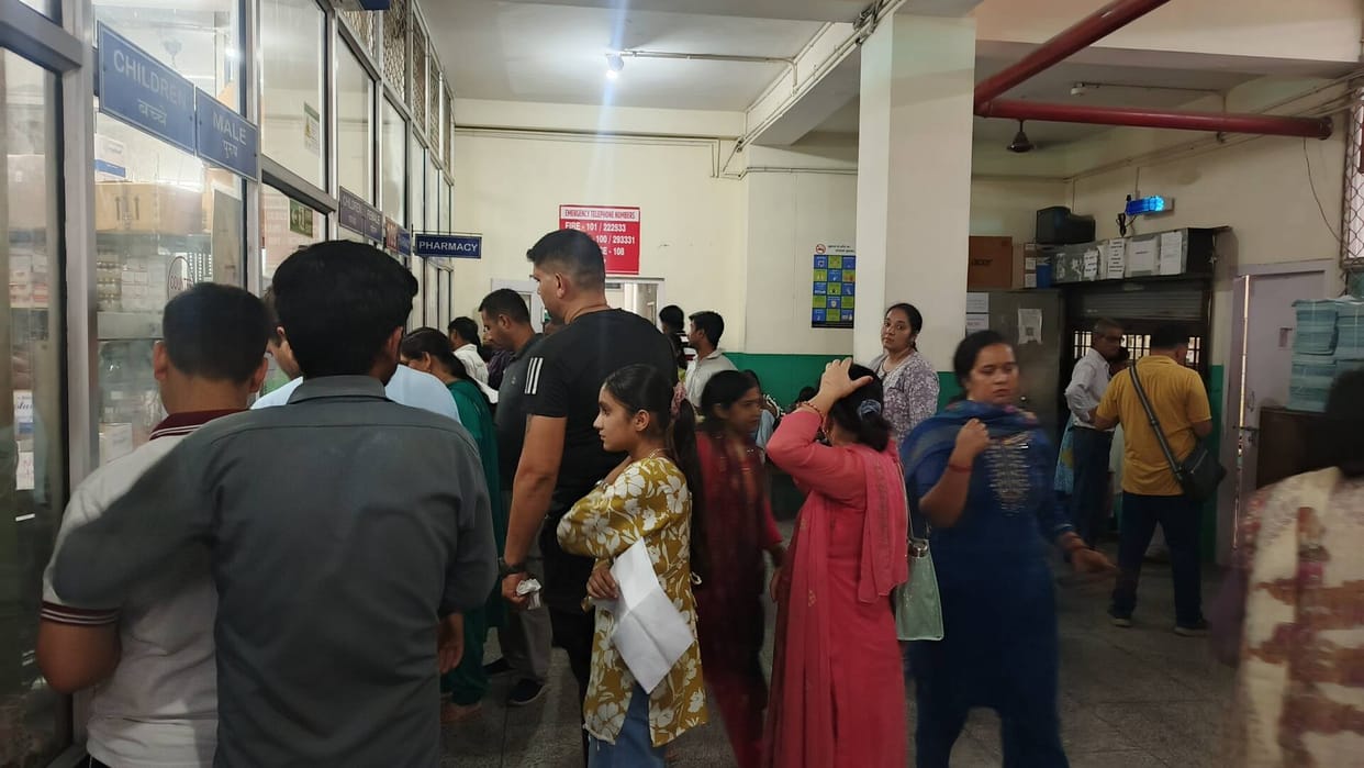 With the sun shining on their heads, prescriptions in hand, and patients wandering around in the hope of getting medicines.