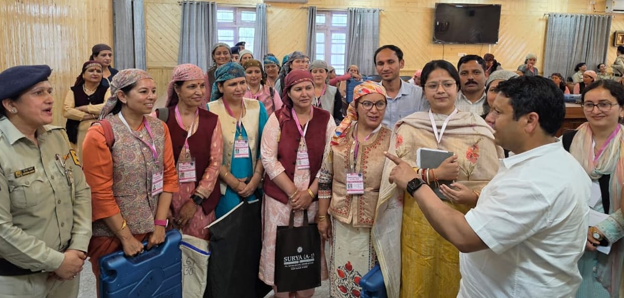Women polling parties leave for polling stations in traditional attire