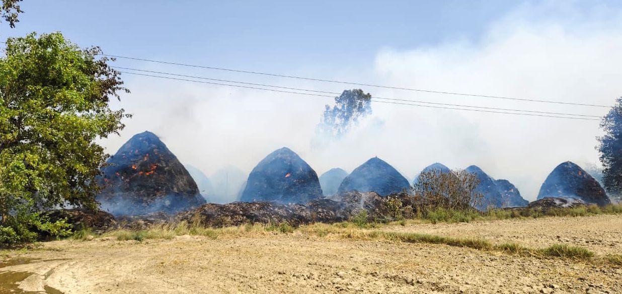 Fire Engulfs 50 Straw Stacks After Spark from Power Line