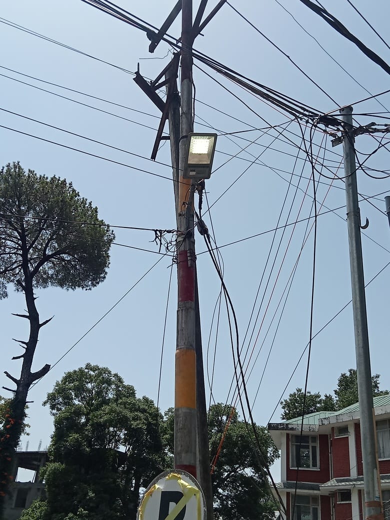 Dharamshala's streetlights are blinding the sun, but the Municipal Corporation is blind.