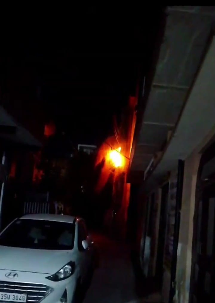 Dilapidated Power Lines Pose a Hazard; Wires Dangling from Walls and Roofs in Several Places