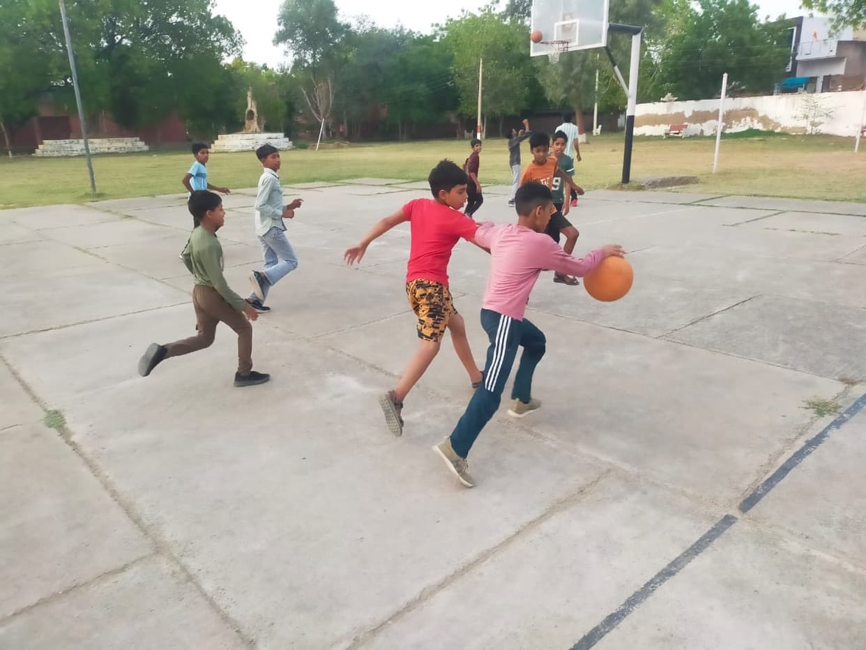 Players preparing for basketball to win a medal.