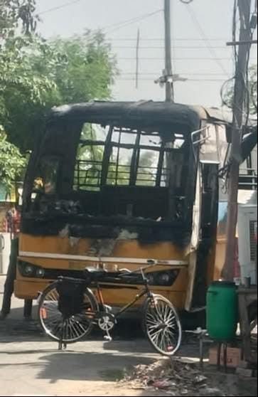 A government school bus caught fire due to a short circuit, a major accident was averted.