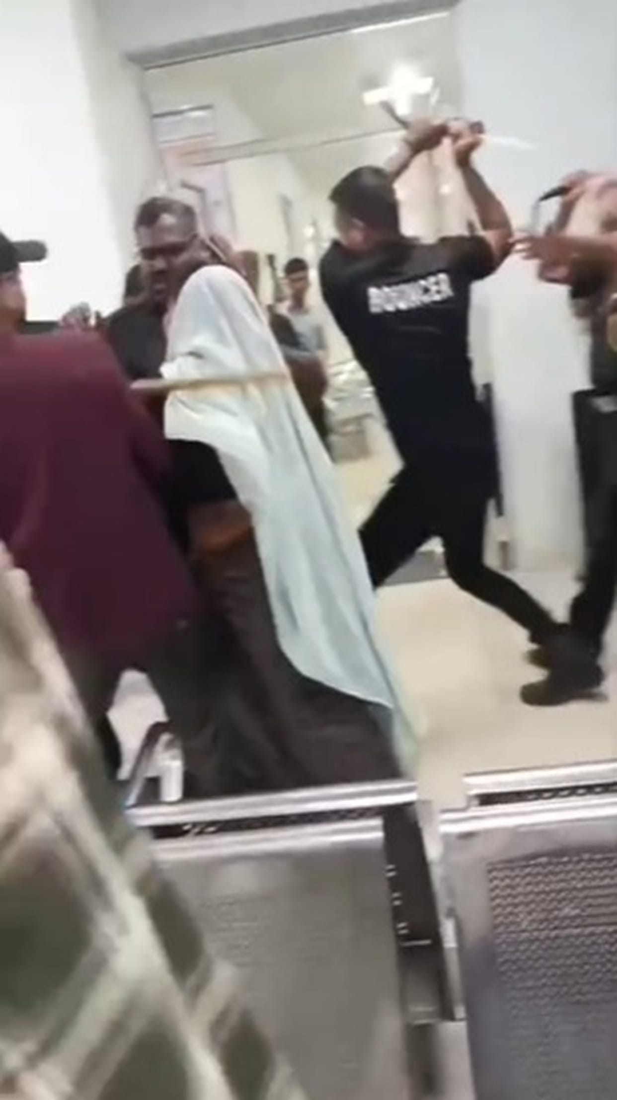 Security personnel rained blows with sticks on a couple who had come to the medical college to get their daughter examined