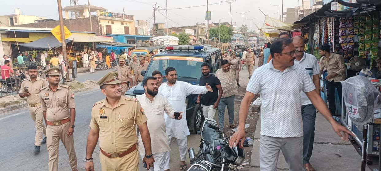 Police removed temporary encroachments along the roadside in the market