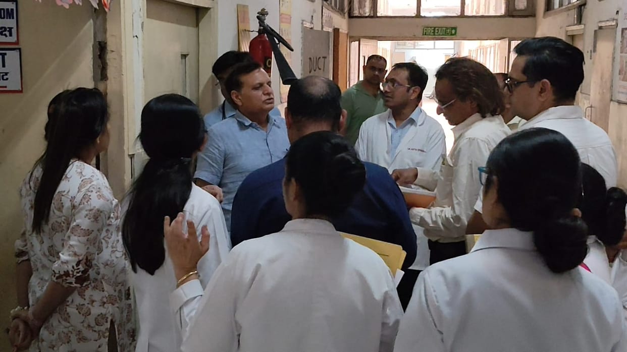 The health director was upset after seeing the mess near the toilet in the hospital.