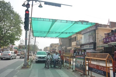 Temporary sheds are being set up at intersections to provide relief from the scorching heat of Nautapa