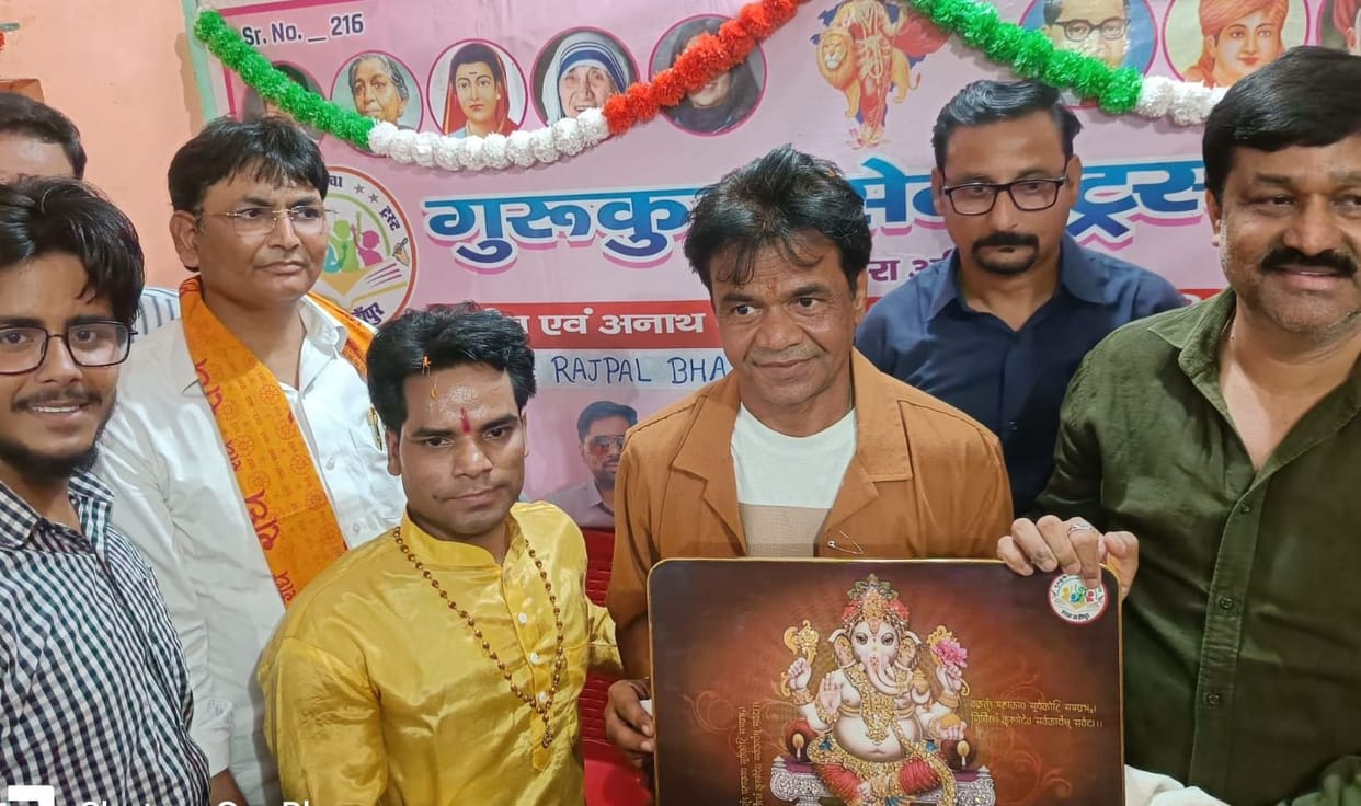 Rajpal met with the children who sent piggy banks to help, and posed for photographs.