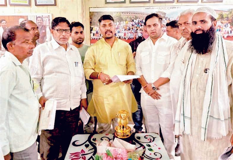 Complaint of occupation of graveyard made to Revenue Minister