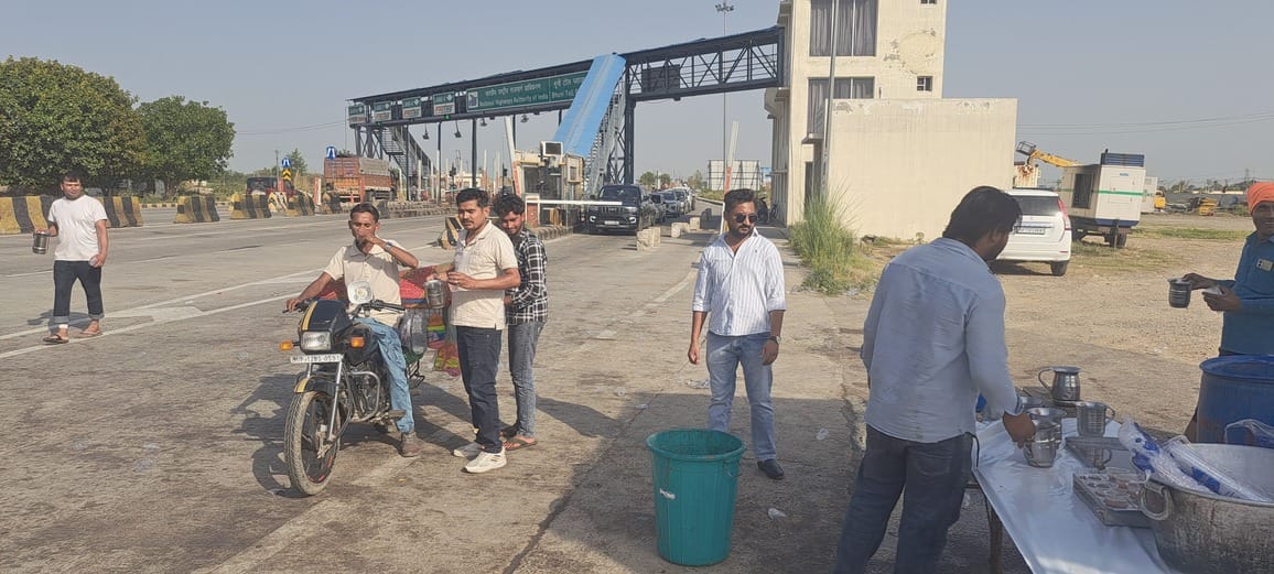 Sharbat distributed to passersby at Bhuni Toll in the scorching heat