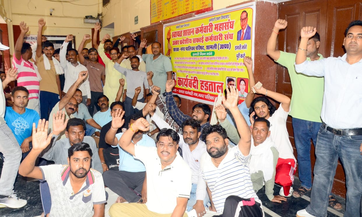 Sanitation workers begin strike, garbage piles up in the city