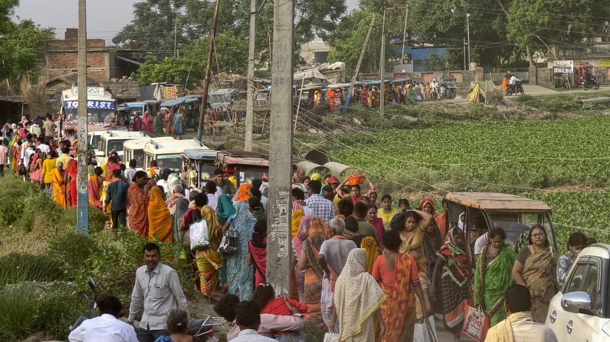 Vehicles were jammed from the road all the way to the Ganga Ghat as people arrived for ritual bathing and head-shaving ceremonies