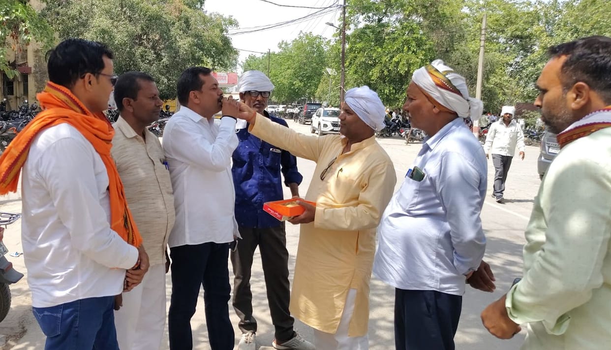 The village heads distributed sweets and celebrated.