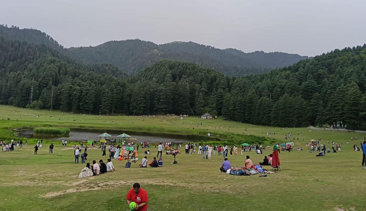 As the mercury rises, Khajjiar buzzes with tourists.