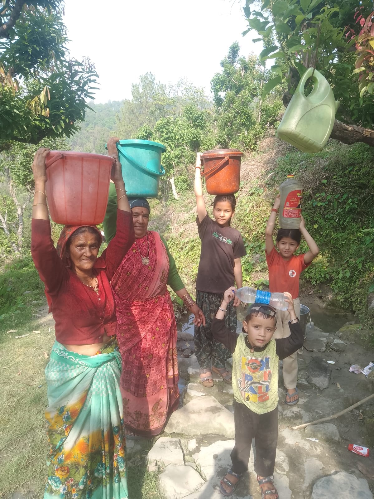 Villagers quench their thirst with springs and streams