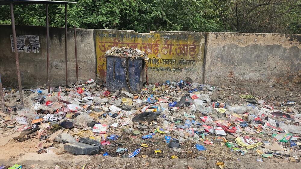 40% of containers are broken, 20% of dustbins have been stolen, and garbage is not being collected daily.
