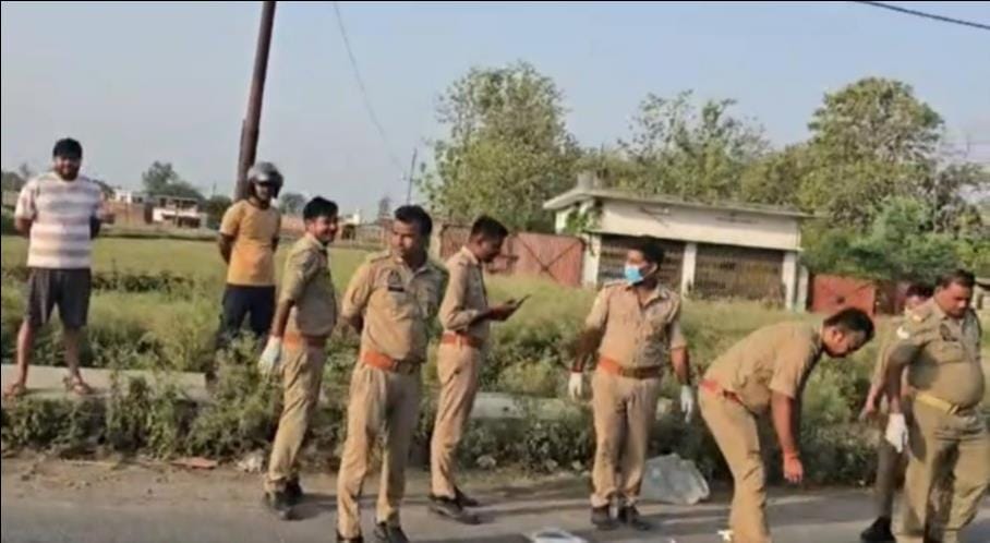 An old woman who had gone out to pluck flowers was crushed to death by a speeding vehicle.