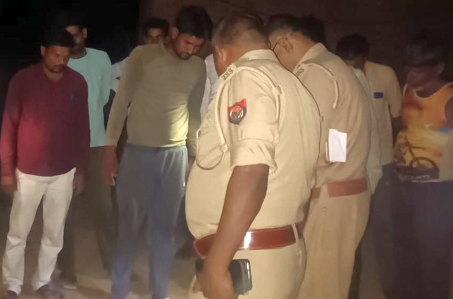 A farmer guarding his crop was beaten to death with sticks and axes.