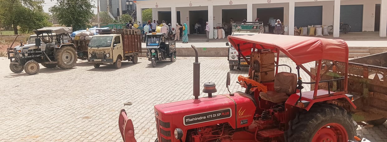 No shade, no water, trouble selling produce, shifting shops to the market has left traders and farmers suffering from the heat.