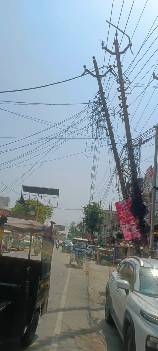 Risk of an Accident Due to Negligence... Teetering Electricity Poles