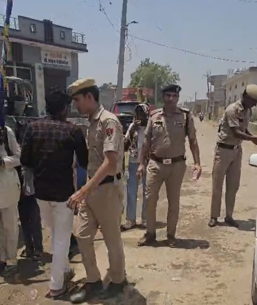 Policemen set up stalls to provide cold, sweet water to passersby.