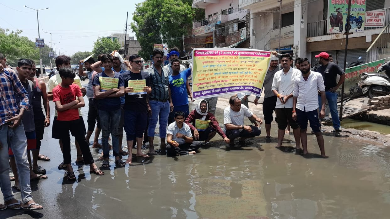 Drain overflows at Rajpur Chungi, people sit on protest amid dirty water