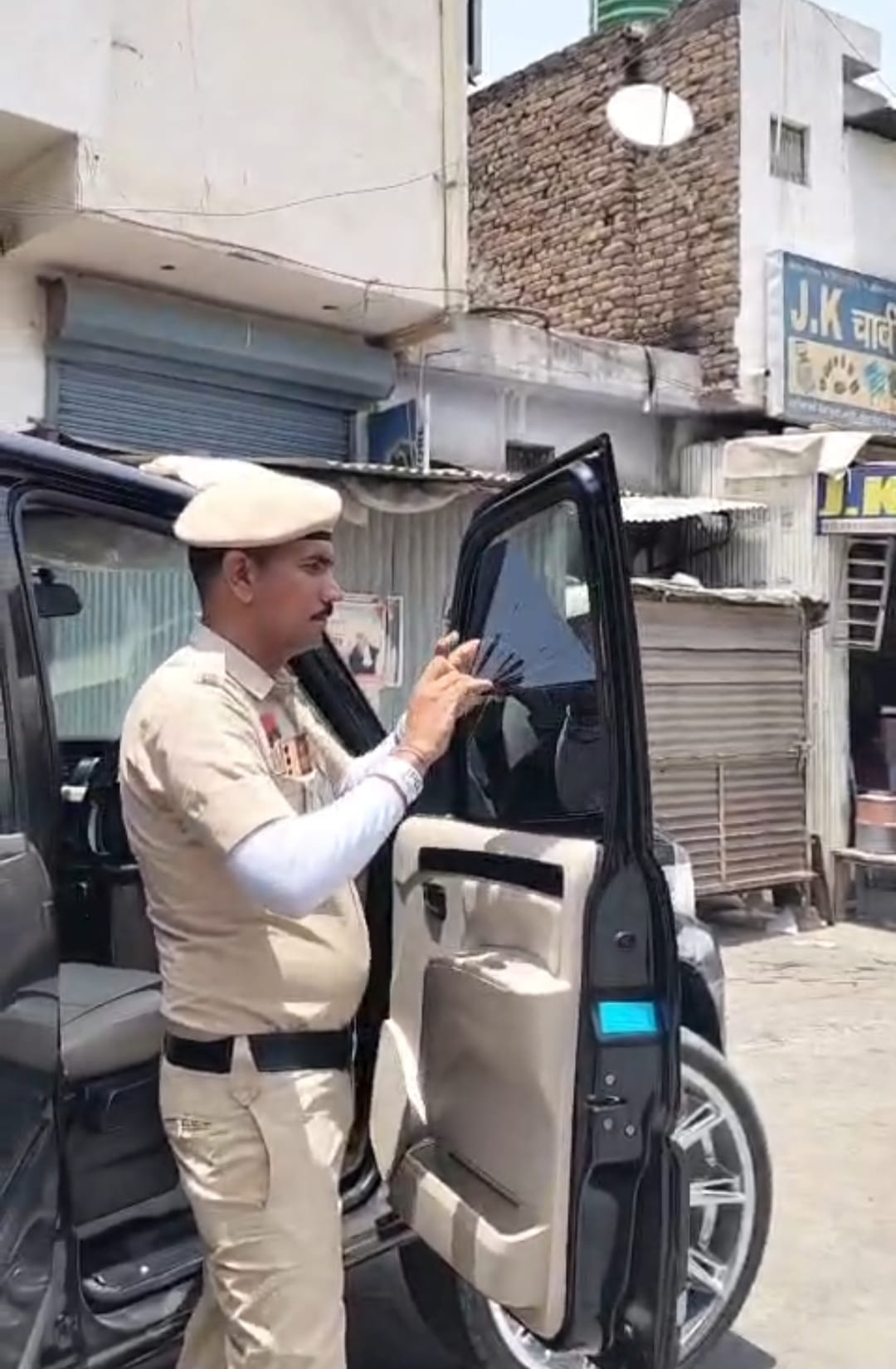 Traffic police seized 3 Bullets and removed black film from Scorpio