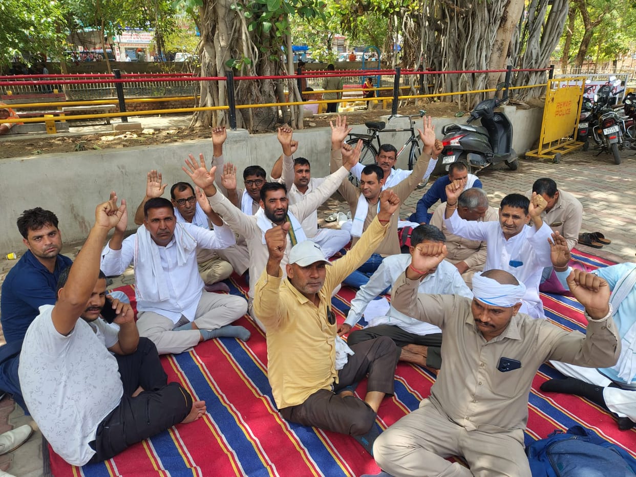 Roadways employees staged a sit-in at the bus stand premises.