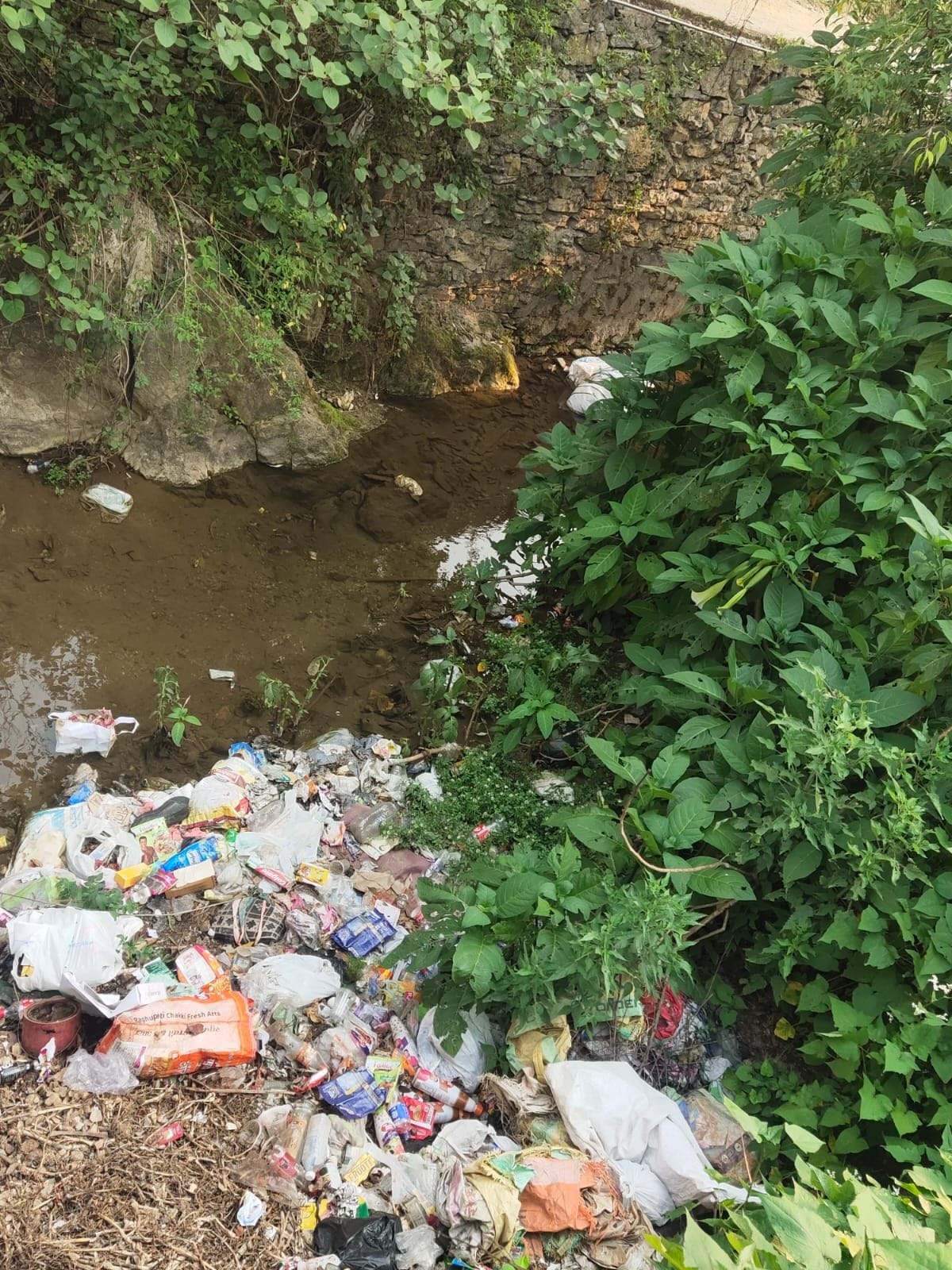 Due to lack of cleaning, the drains are filled with garbage and dirt.