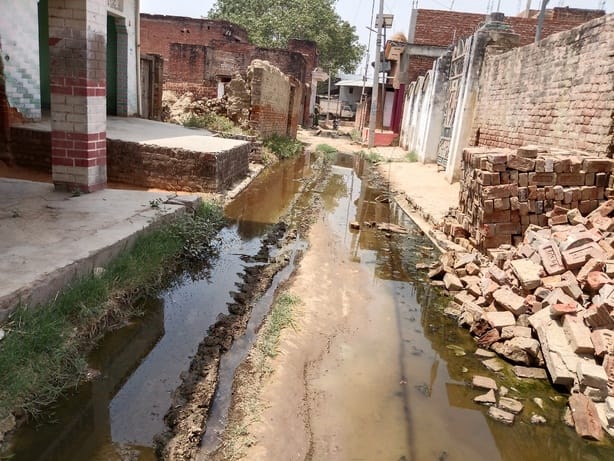 Model village status achieved, yet villagers struggle with waterlogging and filth