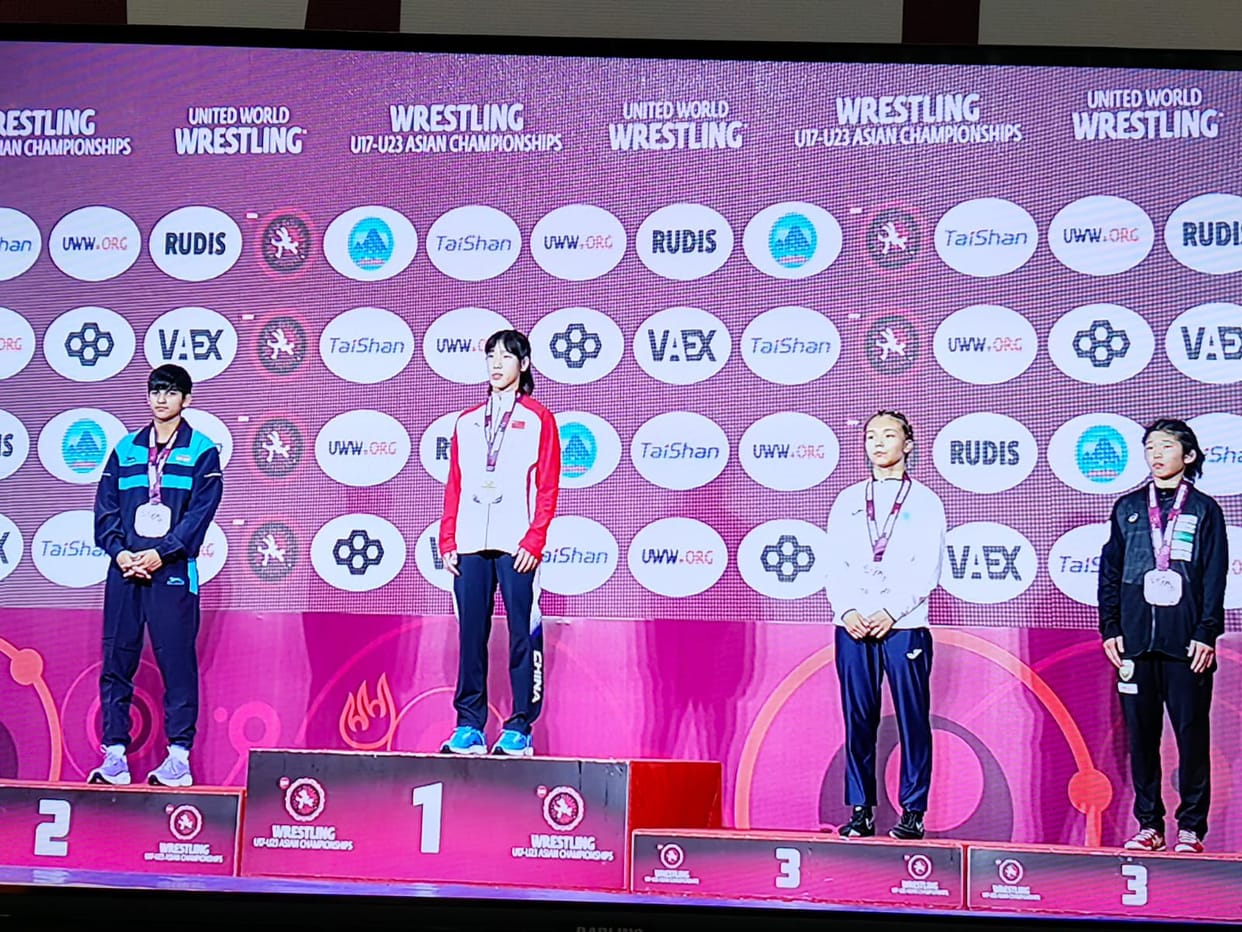 Nikita won a silver medal in the wrestling championship.