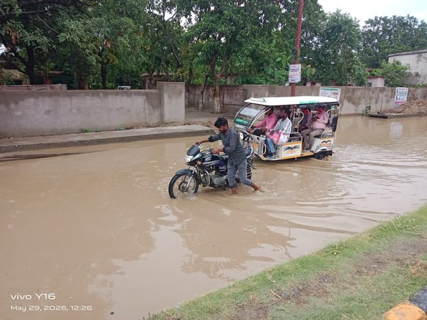 The service lane of the under-construction flyover turned into a pond after it rained.