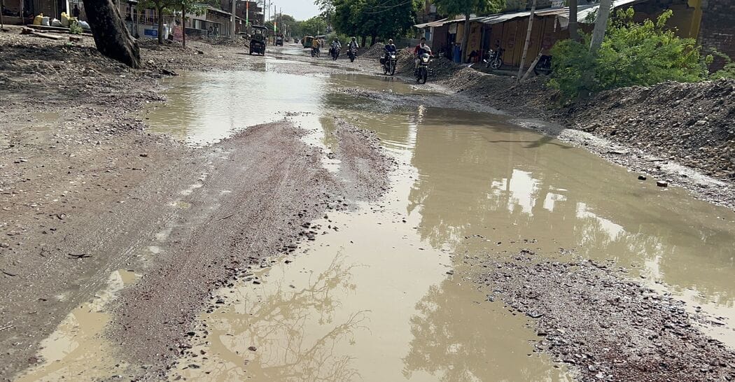 After the rain, the Khaga-Naubasta road was waterlogged and slippery, causing problems for pedestrians.