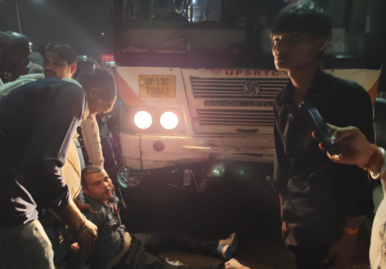 Scooty Rider's Legs Crushed in Bus Collision on DME