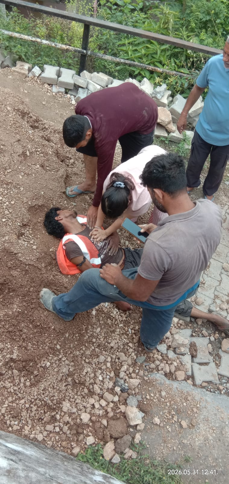 A worker laying a sewerage line was electrocuted and hospitalized.