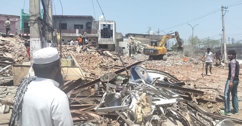 Over 20 structures, including two religious sites, were demolished, with 2,000 police personnel deployed