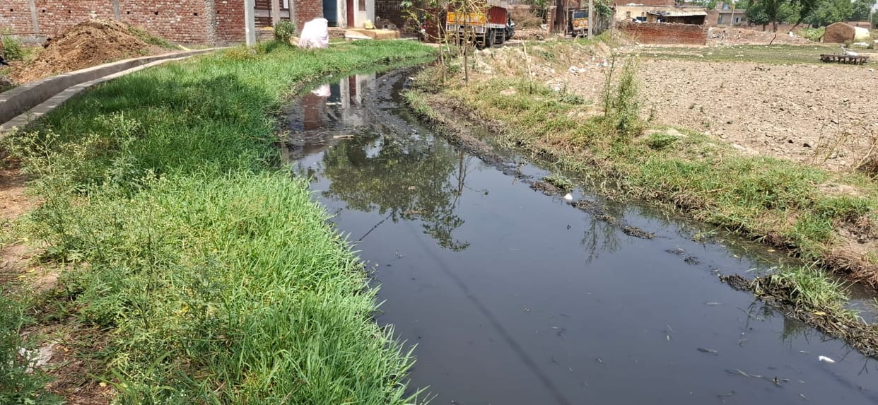 Two villages are at loggerheads over water drainage, facing waterlogging for eight years.