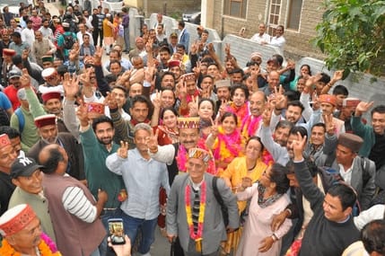 Supporters remained steadfast in the rain to hear the results.