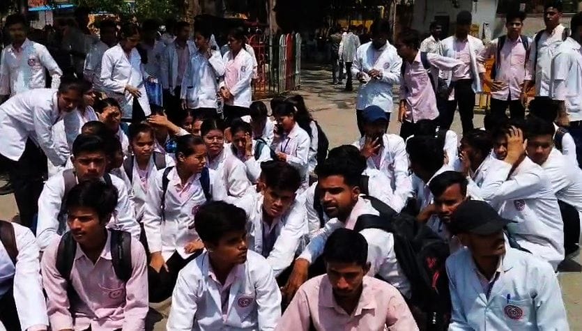 Angry paramedical students staged a protest after a colleague was beaten up at the trauma center.