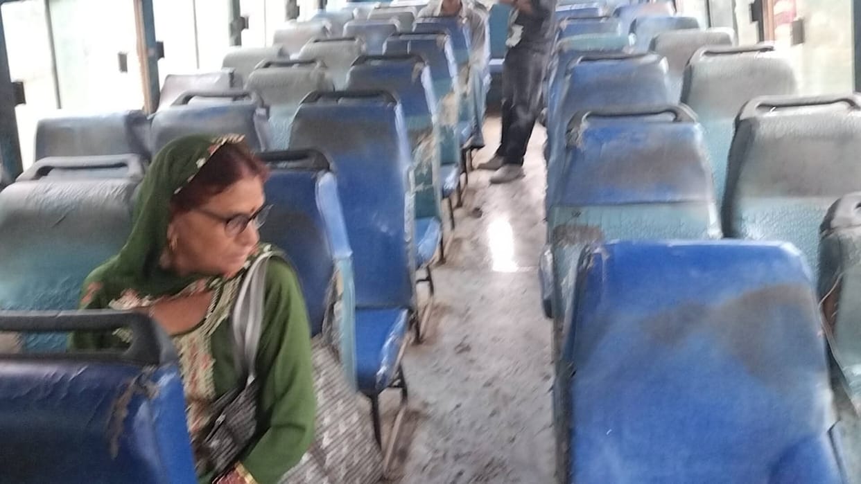 Water dripping from the roofs of moving buses in Ramsar