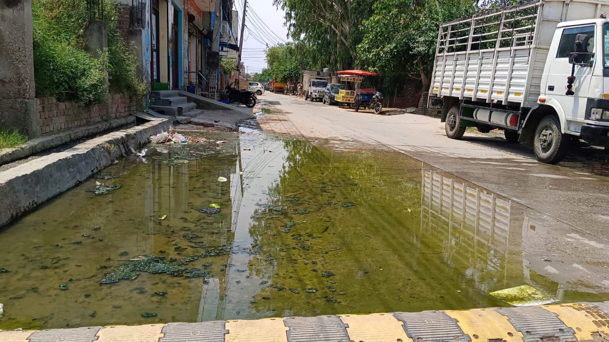 Contaminated water filled the road, causing problems to pedestrians