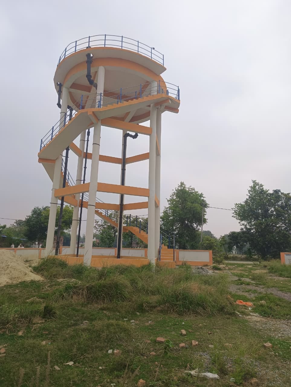 The overhead tank has been incomplete for four years, and the thirst of 4,000 villagers is being quenched by the pillar.