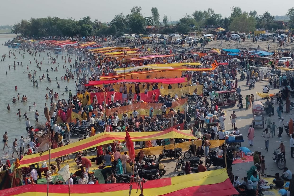 Devotees took a holy dip in the Ganges at Dhai Ghat.