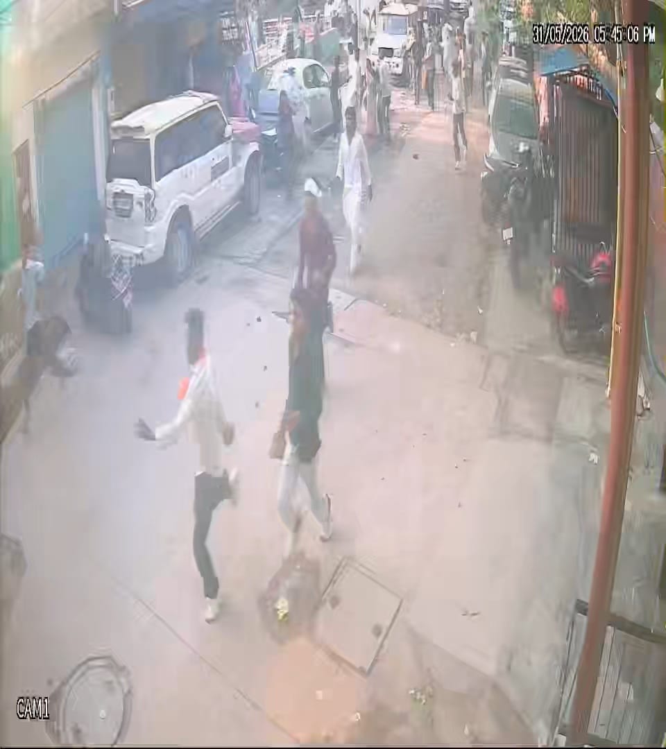 Three people injured in a scuffle and stone-pelting after a bike collision at a rally.