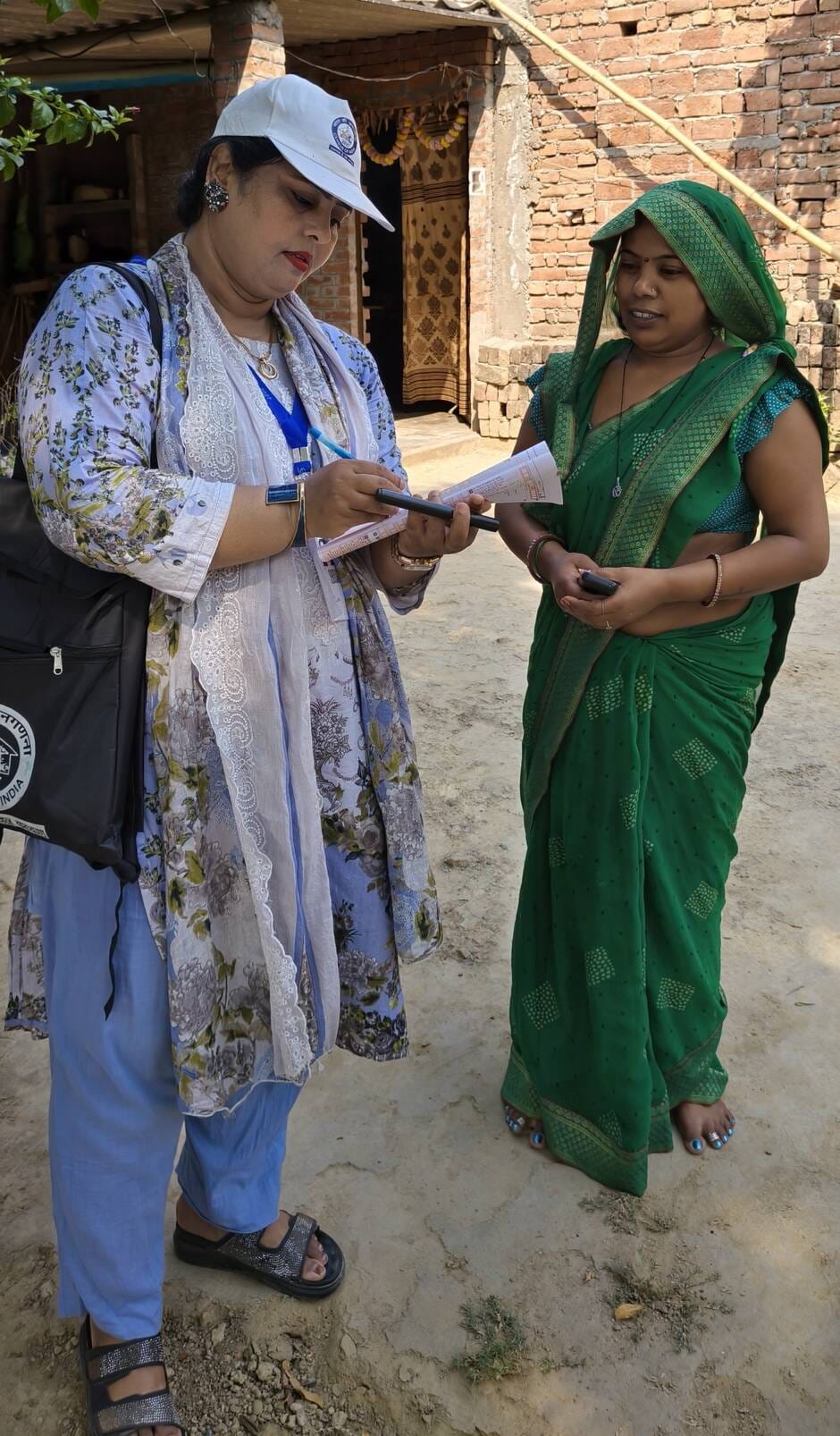 Enumerators are reaching door to door, giving information about the census