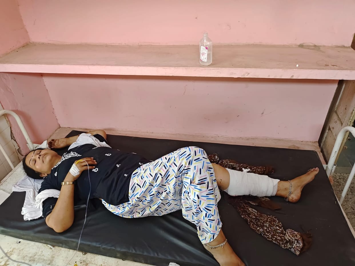 A woman was shot in a dispute over a plot, hitting her in the leg, and was referred to PGI Saifai. The incident occurred near Vidhuna intersection.