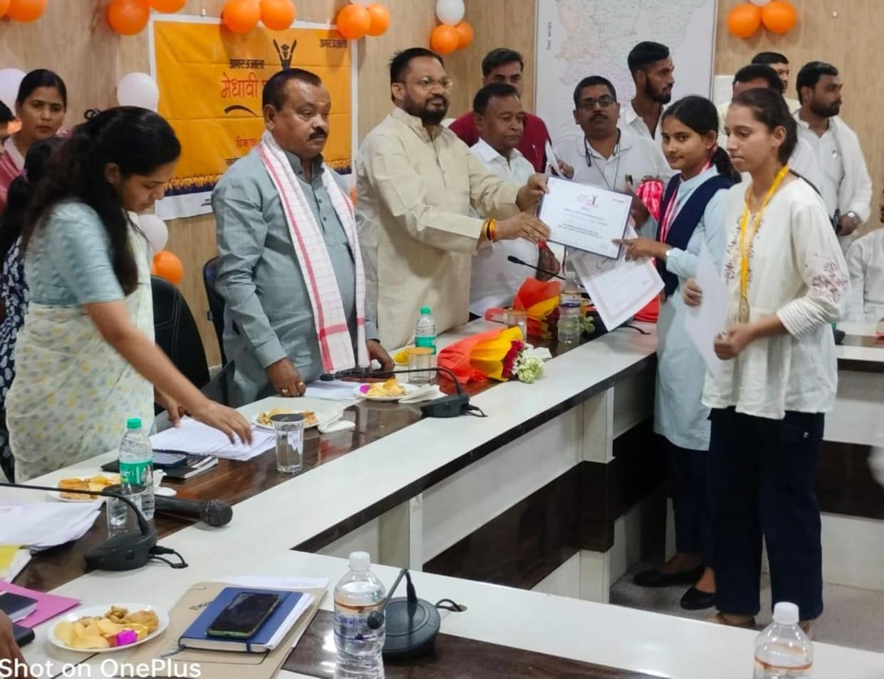faces of the meritorious students blossomed after receiving medals and certificates.