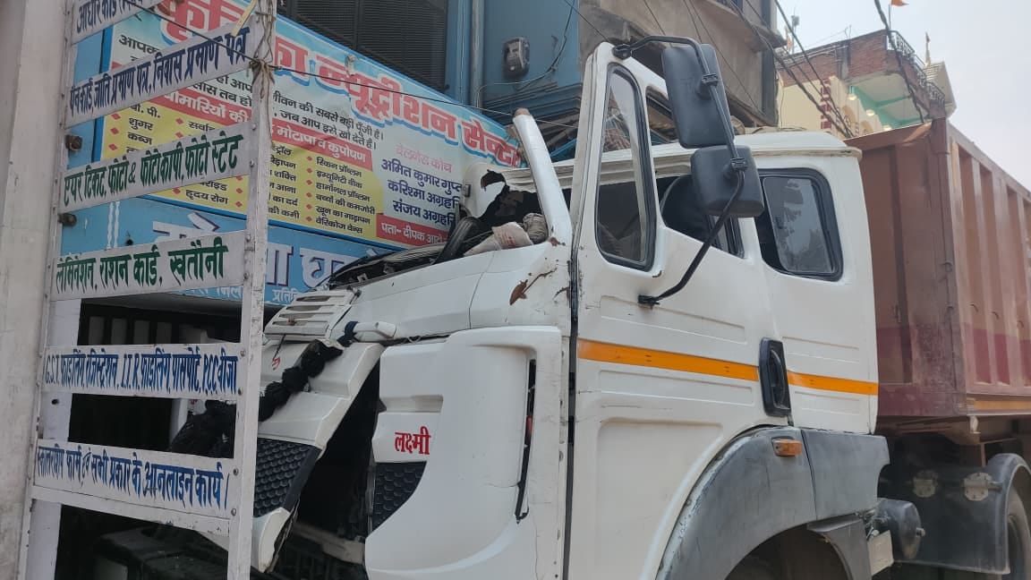A sand-laden trailer went out of control and rammed into a shop, damaging two shops and causing traffic jams throughout the day.