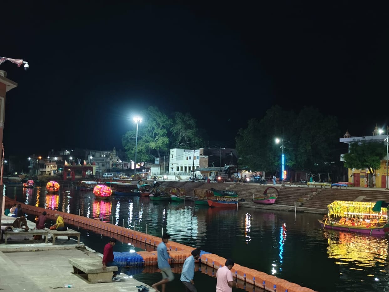 Boats plying in the Mandakini River after 10 pm